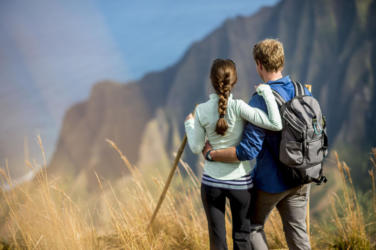 Couple hiking while on vacation in Hawaii 8 Romantic Weekend Activities for Newly-Weds
